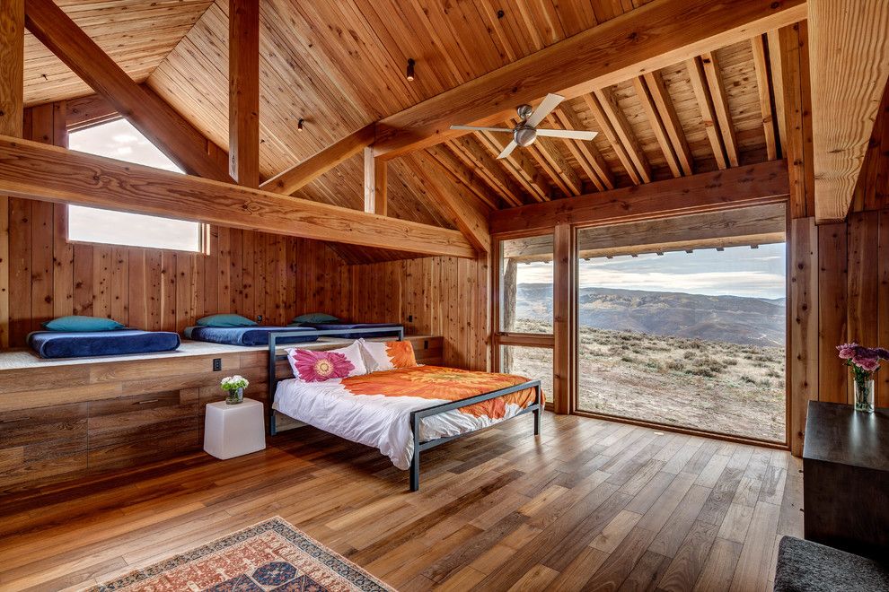 Chippewa Ranch Camp for a Rustic Bedroom with a View and Wolf Creek Ranch by Shubin + Donaldson Architects, Inc.