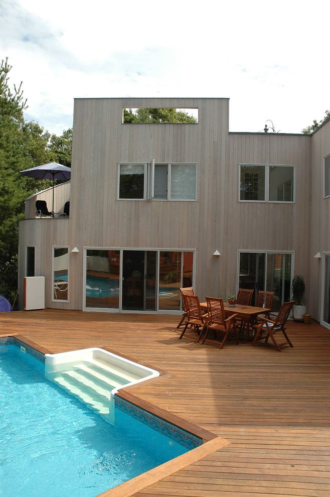 Claffey Pools for a Modern Pool with a Outdoor Dining and Wood, Naturally by Wood, Naturally