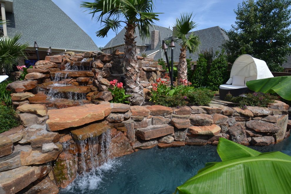 Claffey Pools for a Tropical Landscape with a Tropical Plants and Colleyville Residential Lazy River by Mike Farley Pool Designer