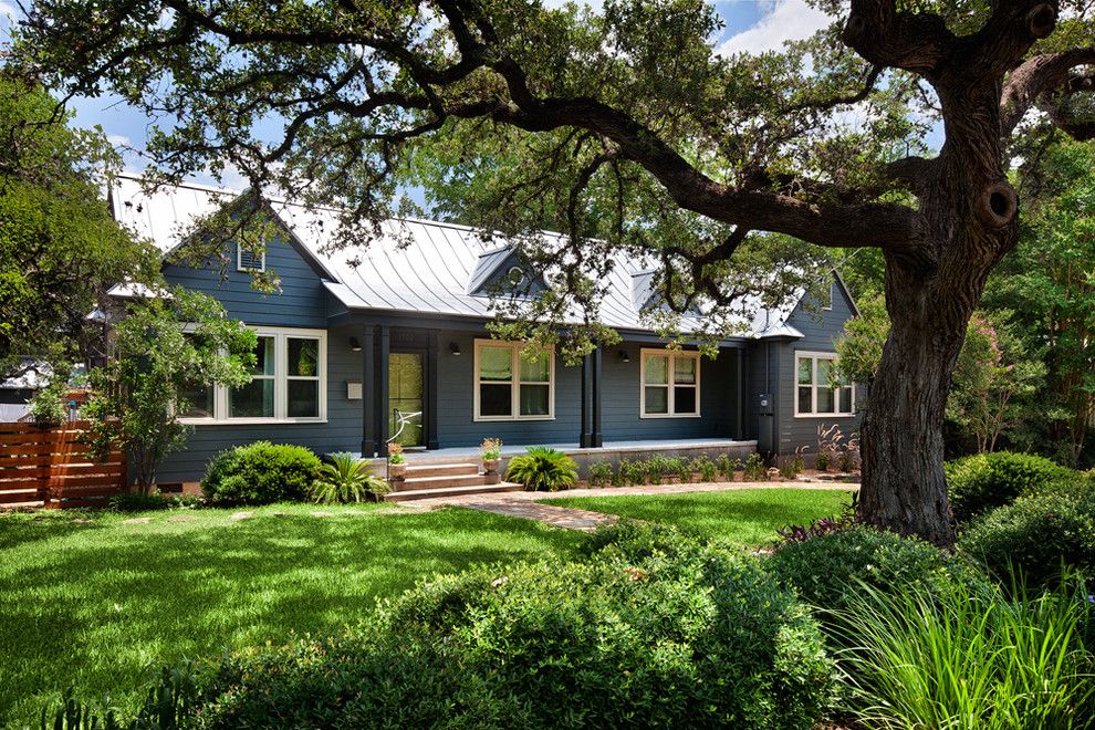 Clapboard for a Traditional Exterior with a Blue House and Purple House by Cg&s Design Build