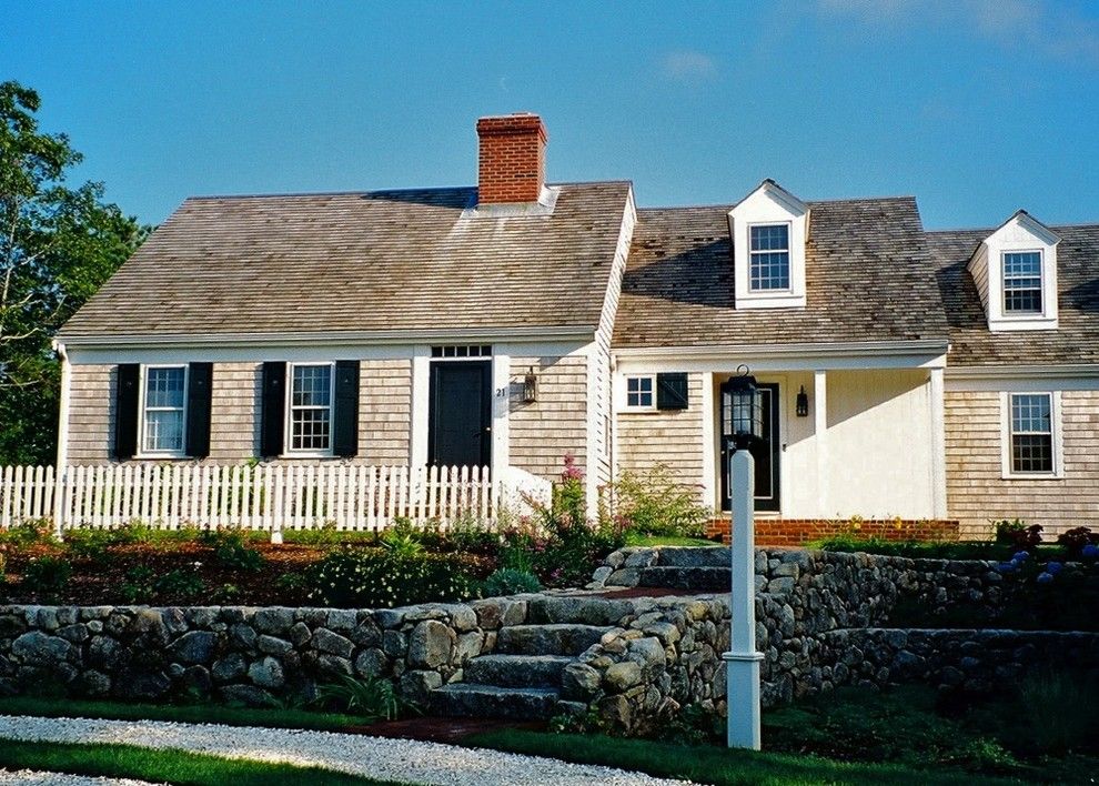 Clapboard for a Traditional Exterior with a Entry and Mill Pond House by Joseph B Lanza Design + Building