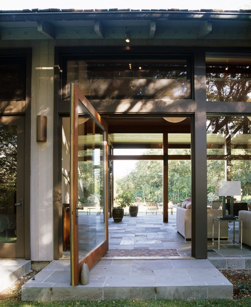 Codel Doors for a Modern Entry with a Table Lamp and Hillsborough Residence by Charlie Barnett Associates