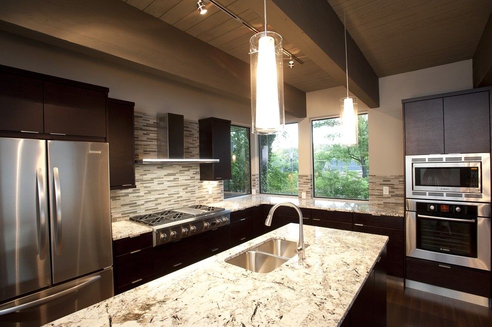 Cold Spring Granite for a Modern Kitchen with a Tile Backsplash and Kitchen by Frontporch