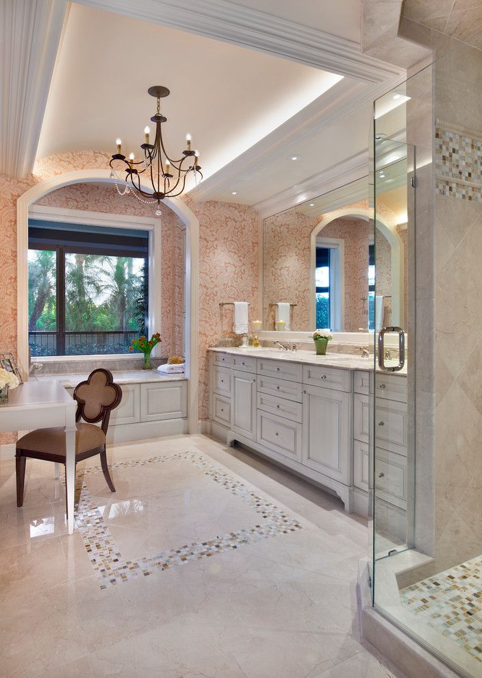 Colefax and Fowler for a Traditional Bathroom with a Chandelier and Master Bath Remodel by Little Palm Design Group