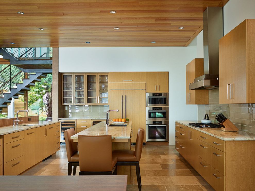 Colonial White Granite for a Contemporary Kitchen with a Kitchendining and Courtyard House by Deforest Architects