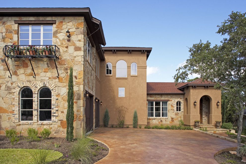 Concrete vs Asphalt for a Mediterranean Exterior with a Concrete Paving and Hathaway Residence by Vanguard Studio Inc.