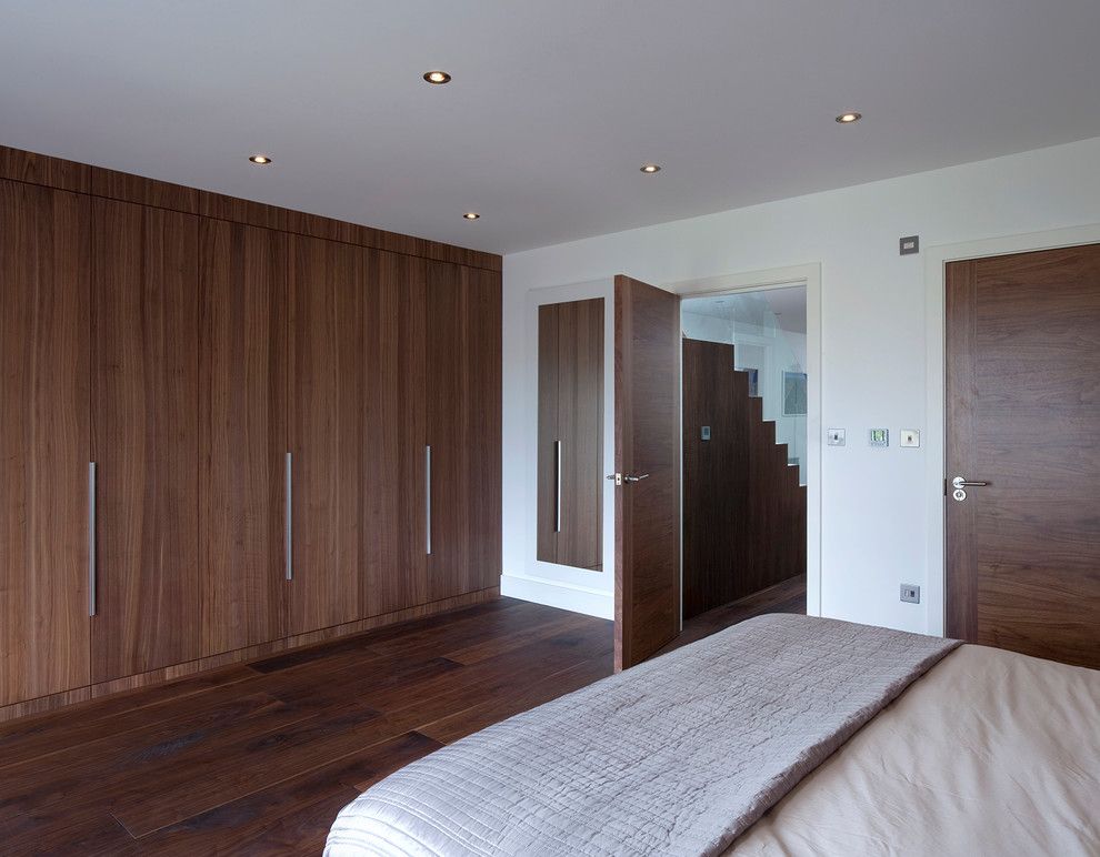 Contractors Wardrobe for a Contemporary Bedroom with a Built in Storage and Kempton House by Locksley Architects