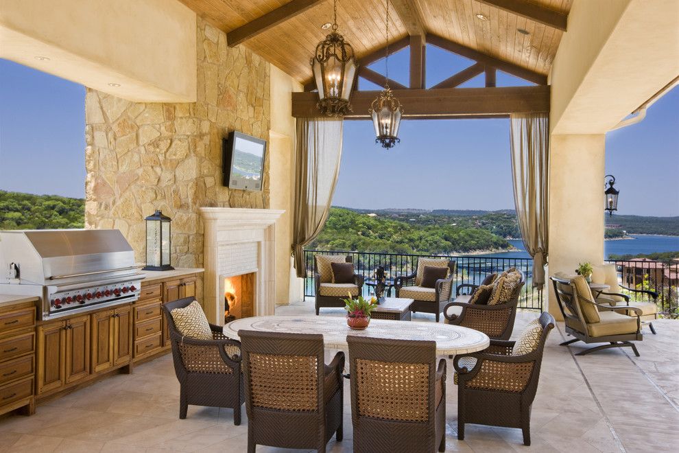 Copenhagen Furniture Austin for a Mediterranean Patio with a Outdoor Dining and Rough Hollow Outdoor Living by Cornerstone Architects