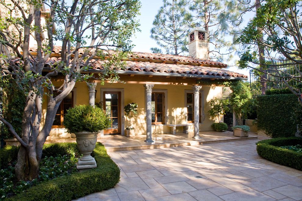 Corinthian Columns for a Mediterranean Exterior with a Arcade and Palos Verdes Mediterranean by Kathryne Designs, Inc