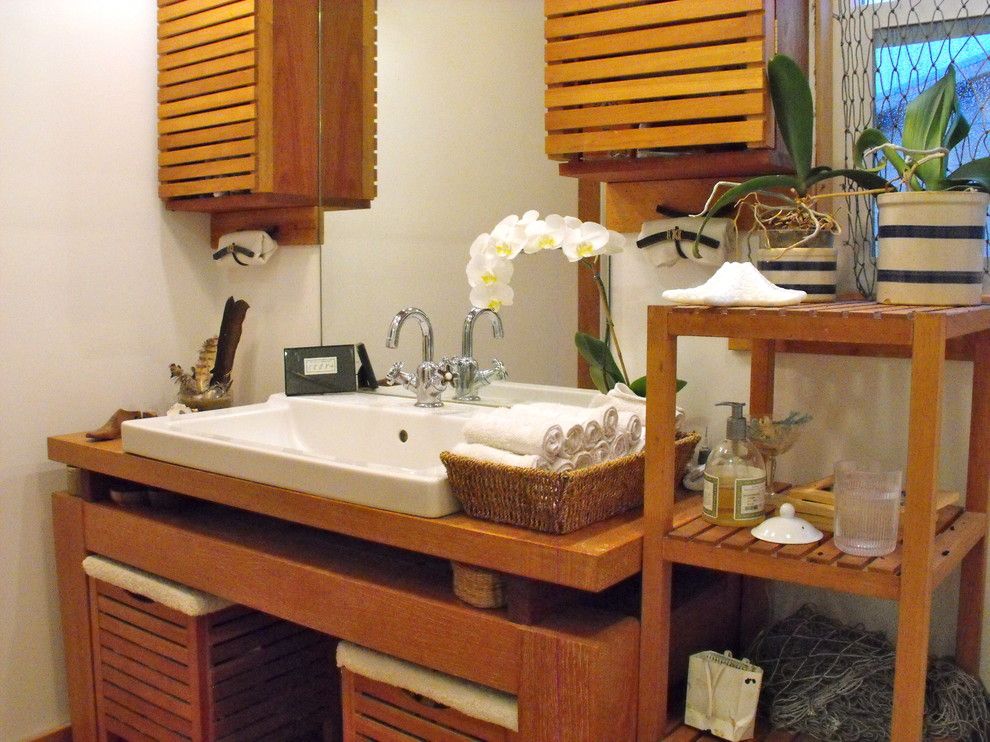 Costco Cabinets for a Rustic Bathroom with a Potted Plants and Tricia Rose by Rough Linen