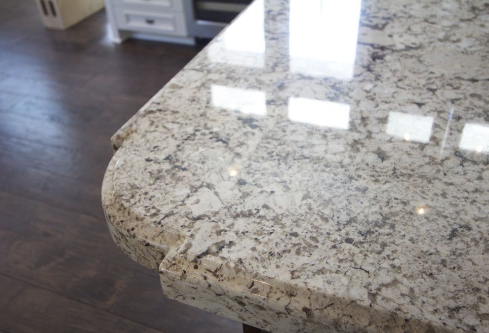 Countertop Edges for a  Spaces with a Contemporary Bar Stools and Granite Countertops by Robeson Design