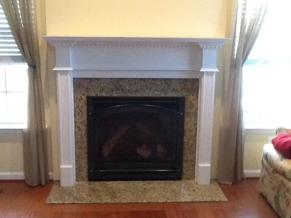 Courtland Hearth for a  Spaces with a Fireplace Mantels and Finished Installs by Courtland Hearth & Hardware