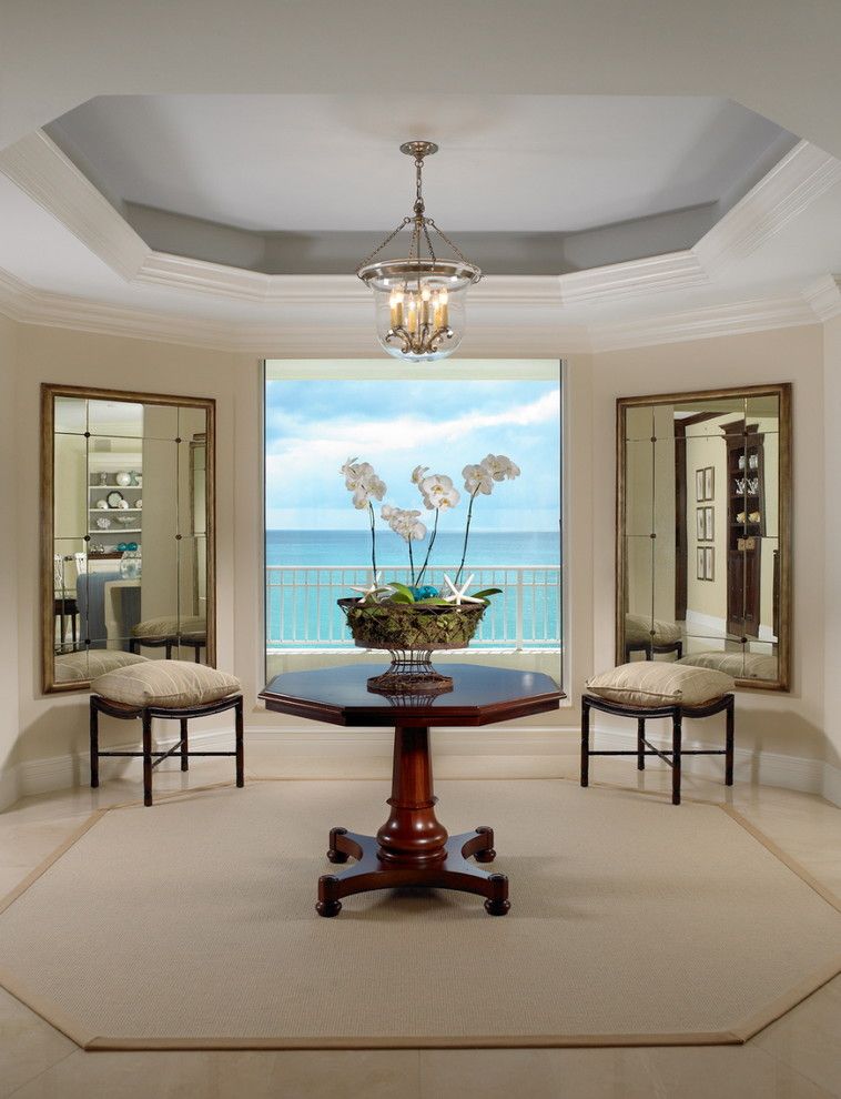 Coved Ceiling for a Beach Style Living Room with a Tile Flooring and Intrinsic Designs Portfolio by Jill Shevlin Design