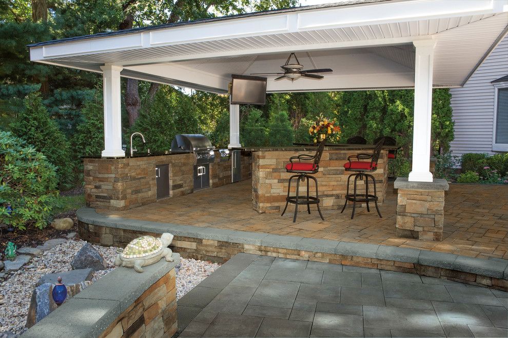 Coved Ceiling for a Contemporary Spaces with a Outdoor Bar and Cambridge Pavingstones with Armortec by Cambridge Pavingstones with Armortec