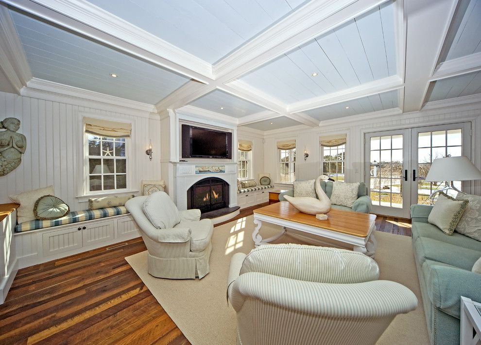 Craftmaster Doors for a Traditional Family Room with a Area Rug and Family Room by Archia Homes