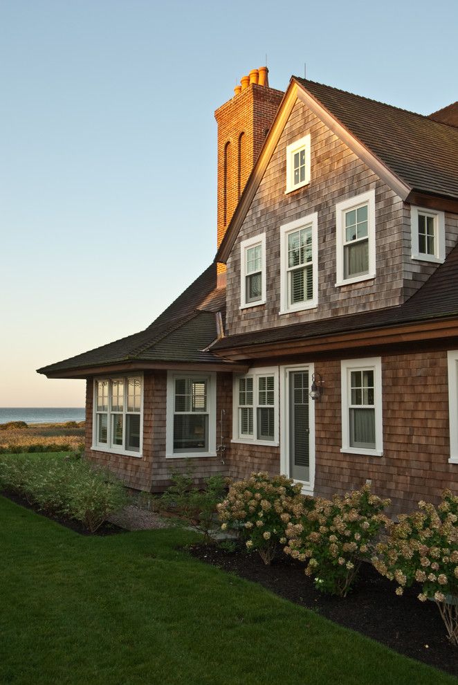 Craftsman Window Trim for a Victorian Exterior with a Coastal Exterior and Watch Hill Oceanfront Residence by Michael Mckinley and Associates, Llc