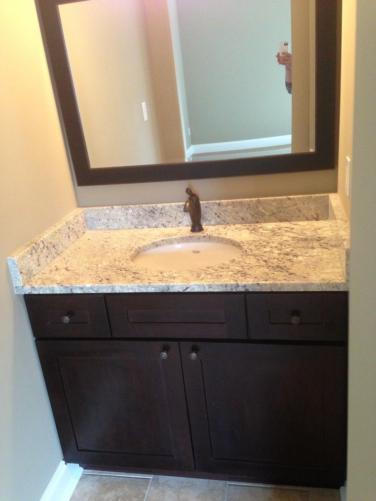 Crema Pearl Granite For A Traditional Bathroom With A