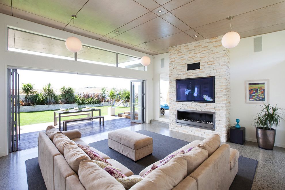 Crestview Doors for a Modern Living Room with a Ceiling Lighting and the Lake House   Creative Space Architectural Design by Andre Laurent