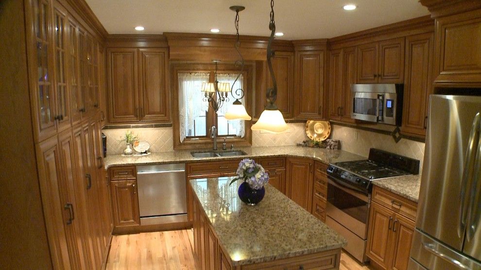 Crown Point Cabinetry for a Mediterranean Kitchen with a Light Wood Flooring and Jay M by Curtis Lumber Ballston Spa