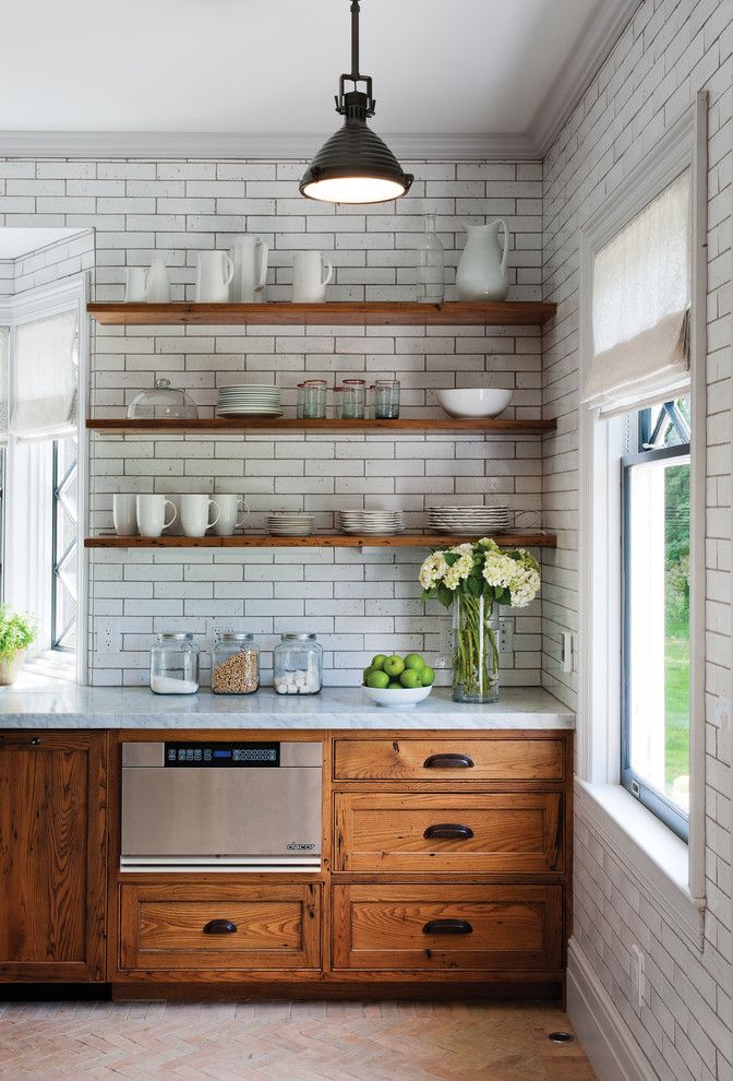 Crown Point Cabinetry for a Rustic Kitchen with a Gray Grout and Rustic Reclaimed Chestnut by Crown Point Cabinetry