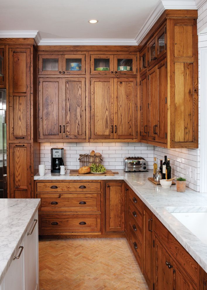 Crown Point Cabinetry for a Rustic Kitchen with a Gray Grout and Rustic Reclaimed Chestnut by Crown Point Cabinetry