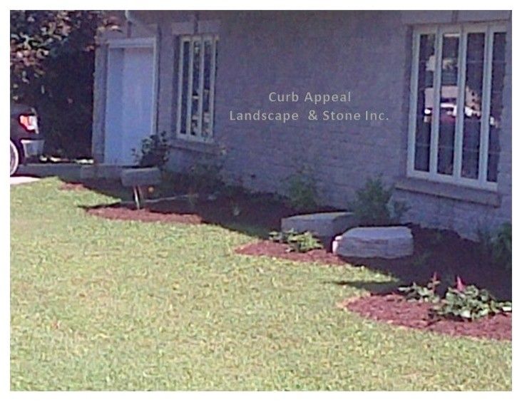 Curb Appeal Landscaping for a  Landscape with a Bubbling Rock and Mark Jutzi Funeral Home   Perth East by Curb Appeal Landscape & Stone Inc.