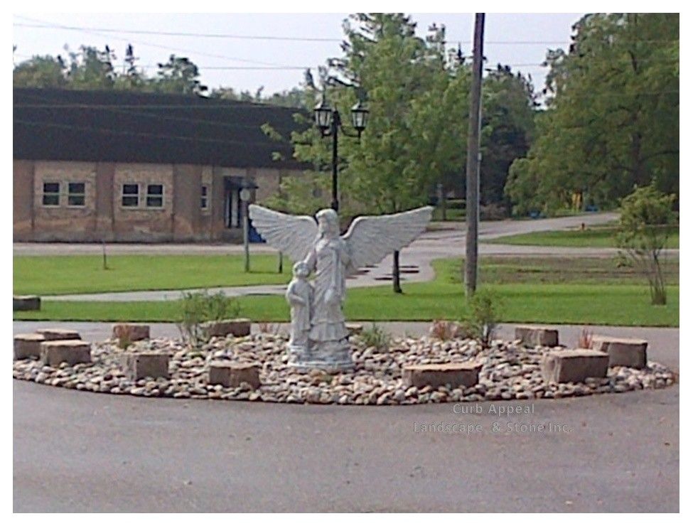 Curb Appeal Landscaping for a  Landscape with a Pondless Water Feature and Mark Jutzi Funeral Home   Milverton by Curb Appeal Landscape & Stone Inc.