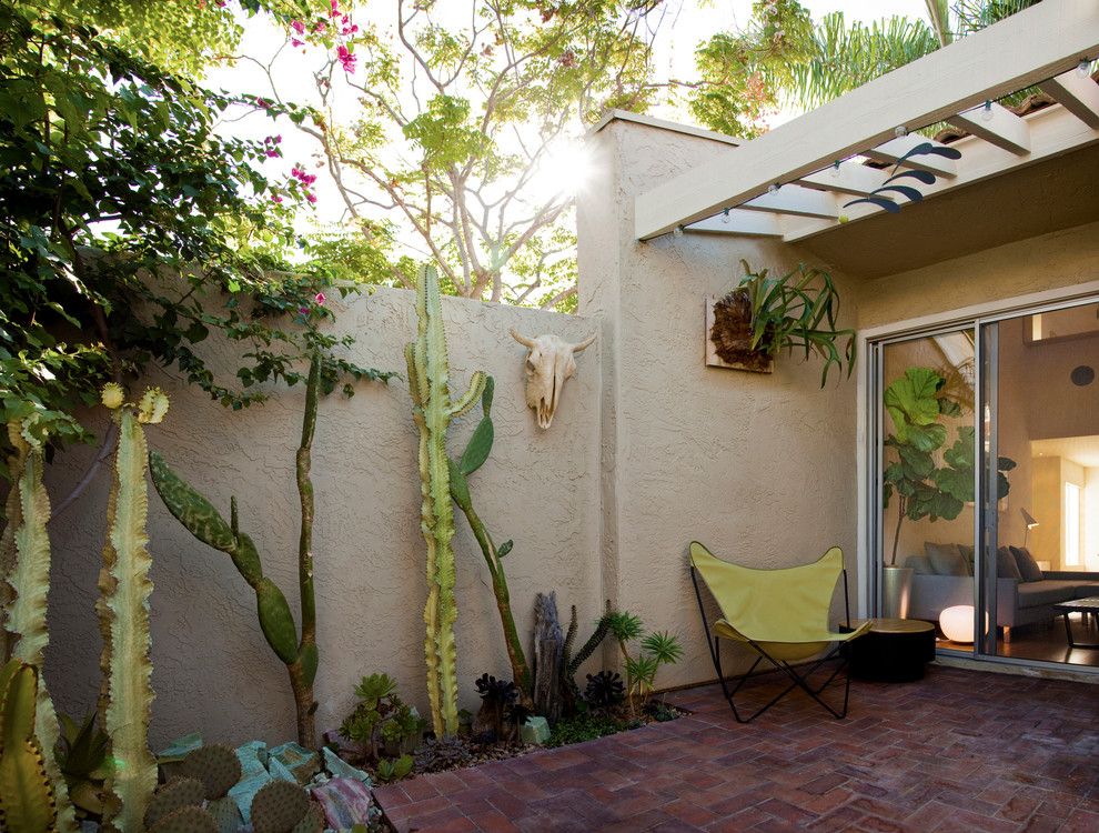 Daltile San Diego for a Southwestern Patio with a Butterfly Chair and Townhouse Renovation in San Diego by Jon+Aud Design