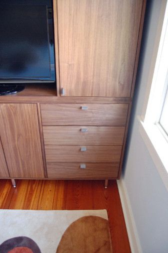 Danish Inspirations for a Modern Bedroom with a Bedroom Dresser and Mid Century Modern Black Walnut Bedroom Unit by John Samuel Custom Cabinetry