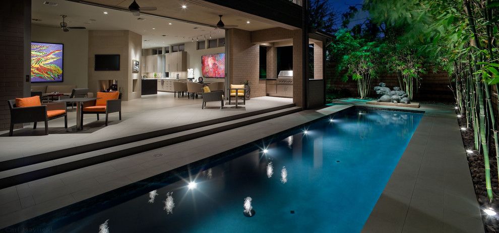 Darling Homes Houston for a Contemporary Pool with a Lap Pool and Contemporary Landscape and Pool Lap Design by Exterior Worlds Landscaping & Design