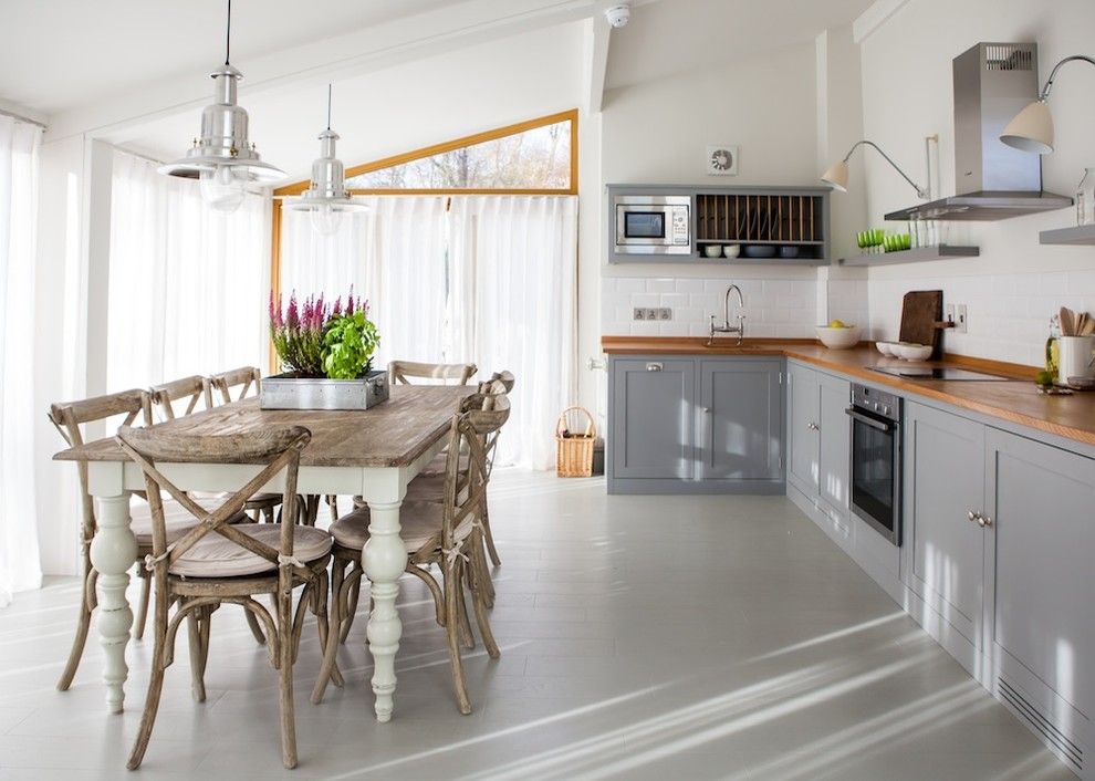 Decluttering for a Farmhouse Kitchen with a Bridge Faucet and Seaside Farmhouse by Gabriel Holland Interior Design