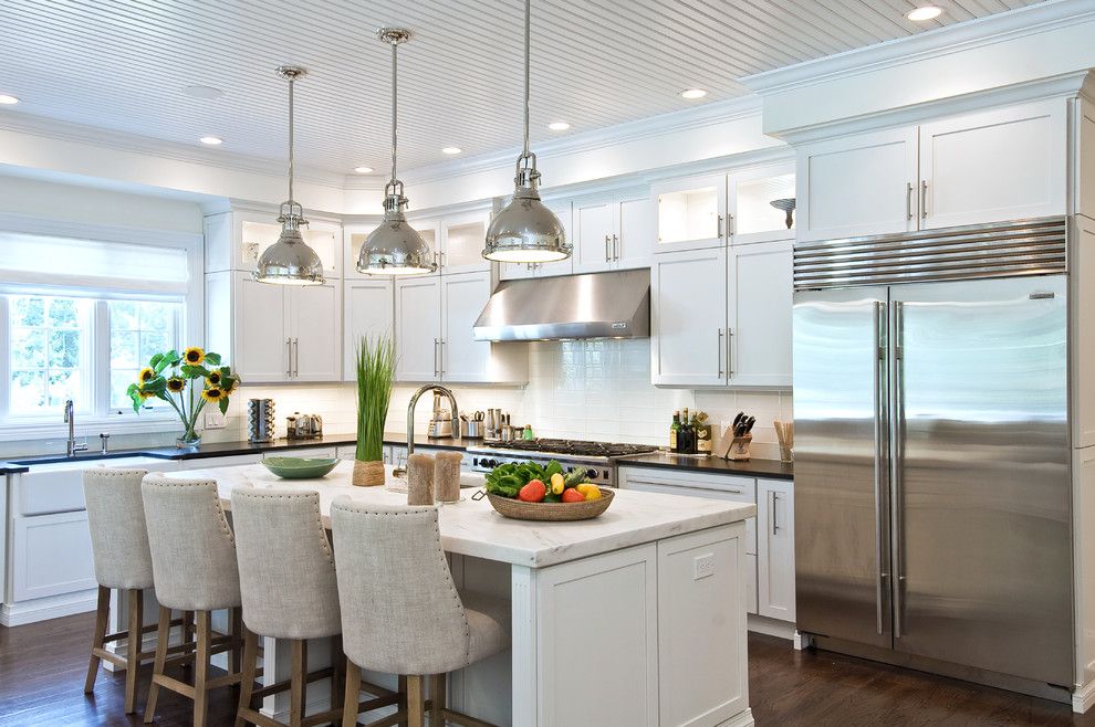 Decora Cabinets for a Traditional Kitchen with a Bar Stool and Wainscott South by Eb Designs