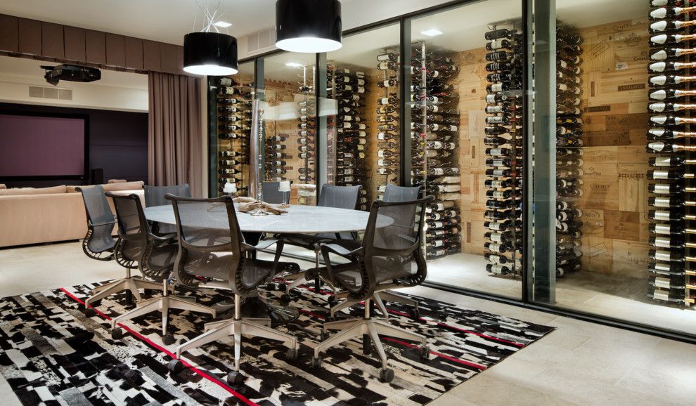 Del Monte Theater for a Contemporary Wine Cellar with a Dining Room and Cascading Creek House by Spencer Construction Llc.