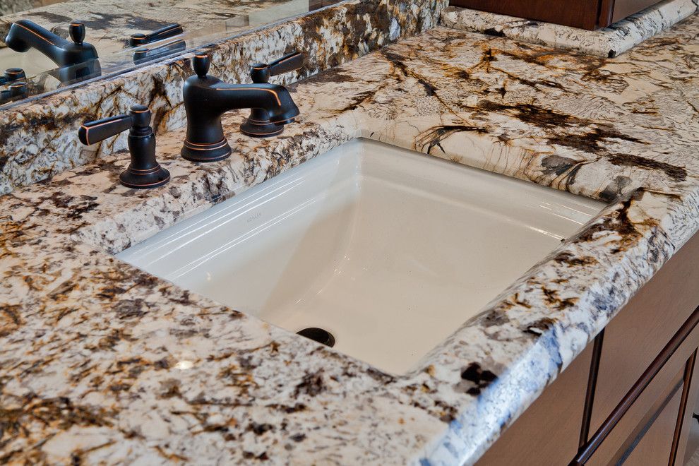 Delicatus Granite for a Contemporary Bathroom with a Black Bathroom Faucet and Juperana Delicatus Granite Tub Surround & Matching Vanities by Granite Grannies