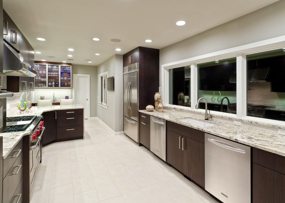 Delicatus Granite for a Contemporary Kitchen with a Countertop and Buckingham by Jay Rambo Co.