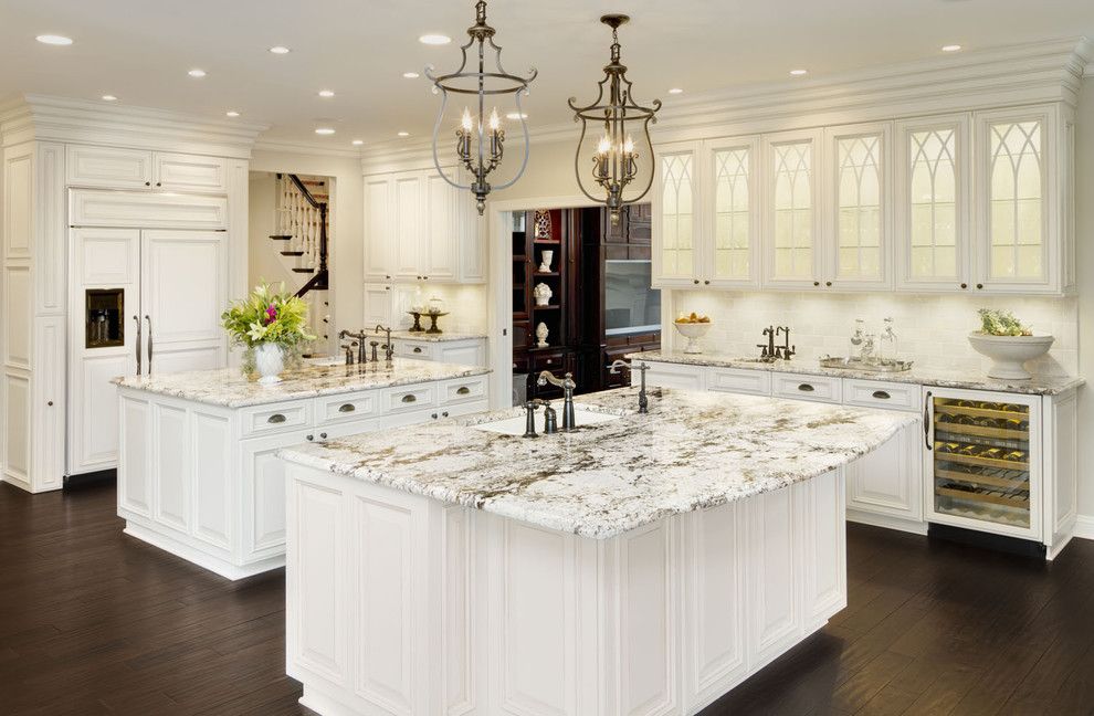 Delicatus Granite for a Traditional Kitchen with a Double Islands and Kitchen by Kanncept Design, Inc.