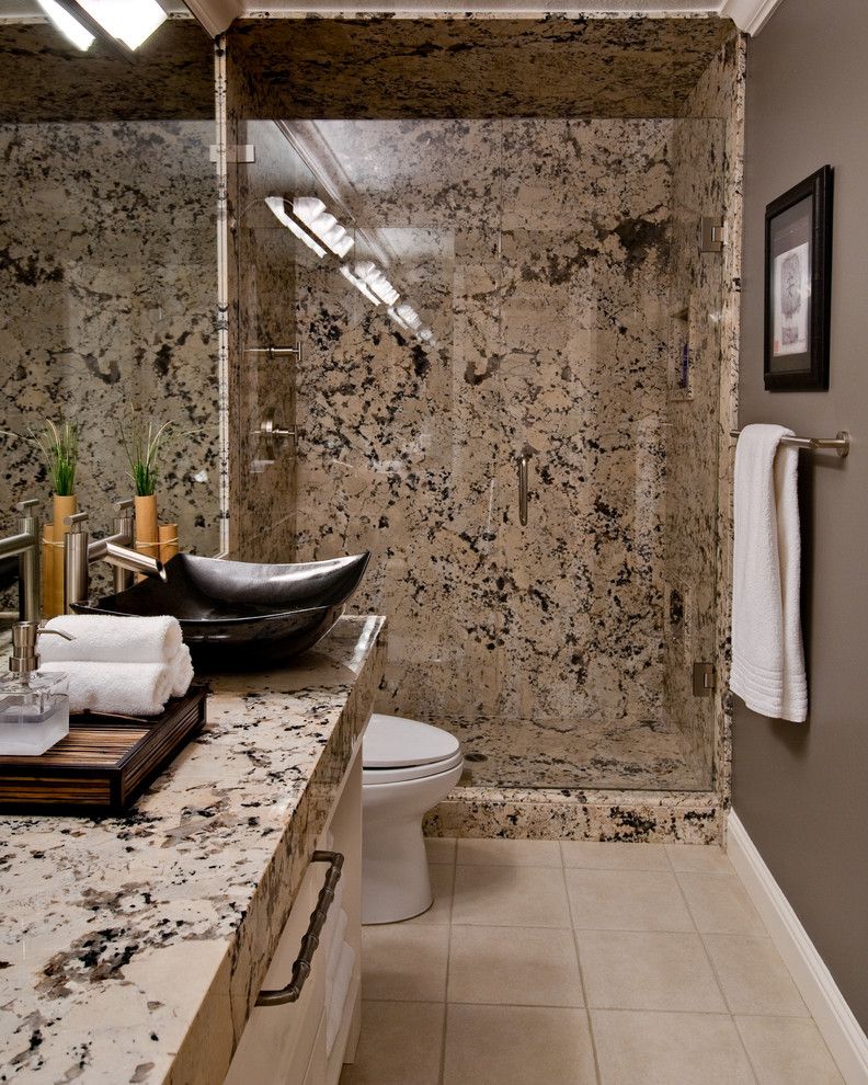 Delicatus White Granite for a Contemporary Bathroom with a Waterfall Faucet and Burke by Almaden Interiors, Inc.