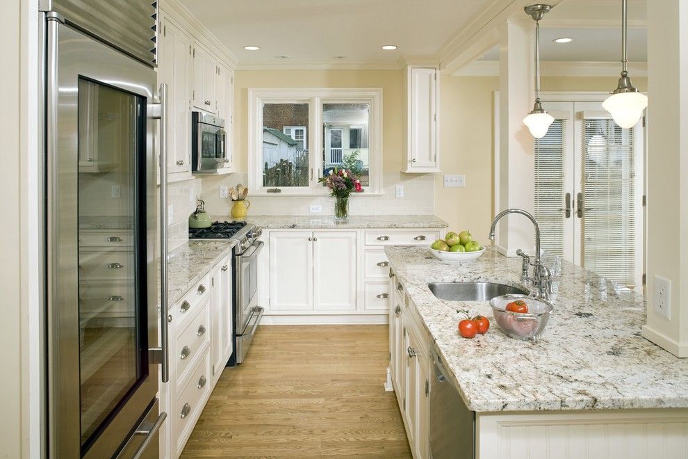 Delicatus White Granite for a Traditional Kitchen with a Bright Kitchen and Alexandria Timeless Kitchen Addition by Erin Hoopes