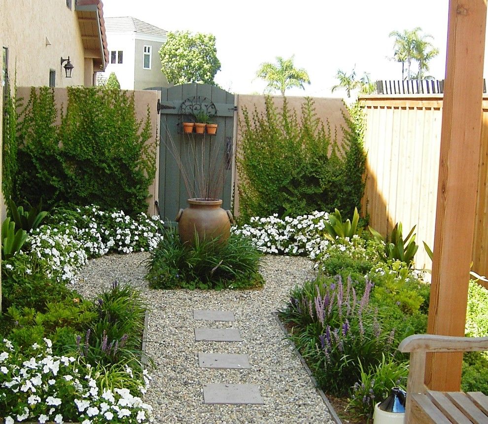 Desert Landscaping Ideas for a Mediterranean Landscape with a Wood Fence and Debora Carl Landscape Design by Debora Carl Landscape Design