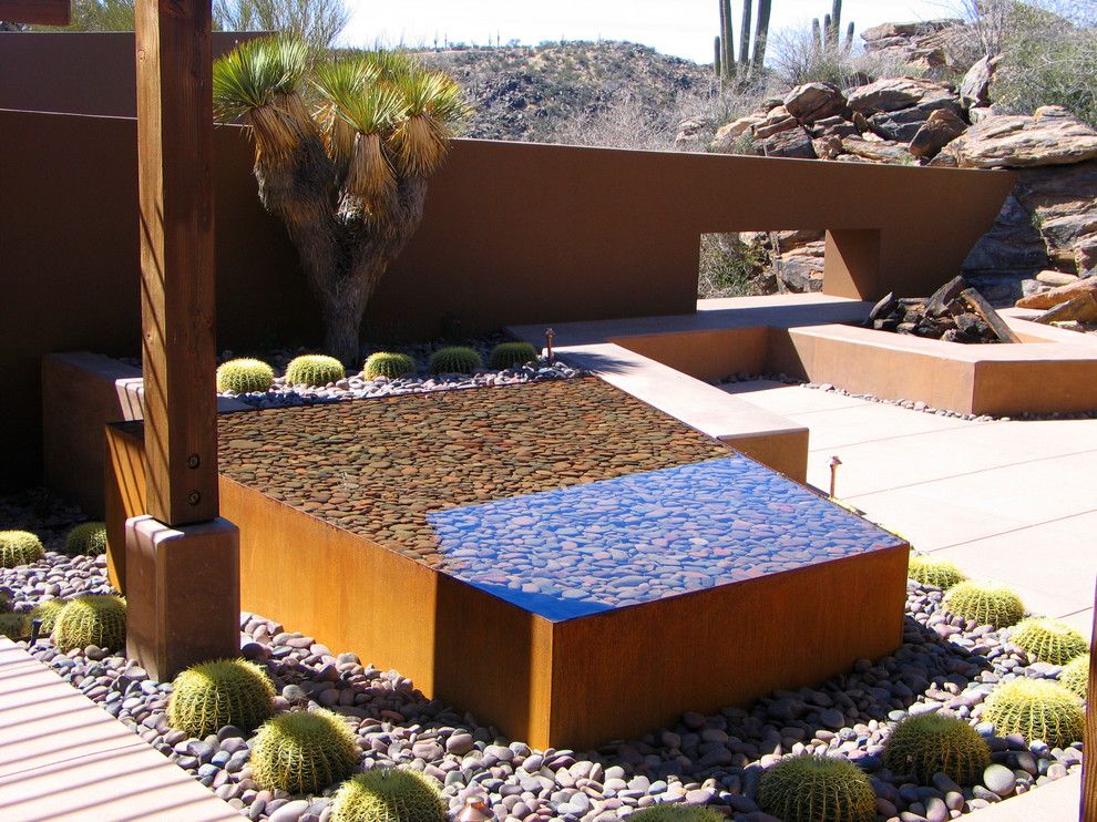 Desert Landscaping Ideas for a Southwestern Patio with a Cast in Place Concrete and Rancho Nuevo by Bianchi Design