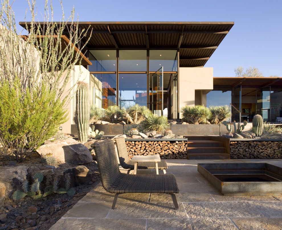 Desert Landscaping Ideas for a Southwestern Patio with a Sonoran Desert Courtyard and the Brown Residence by the Construction Zone, Ltd.