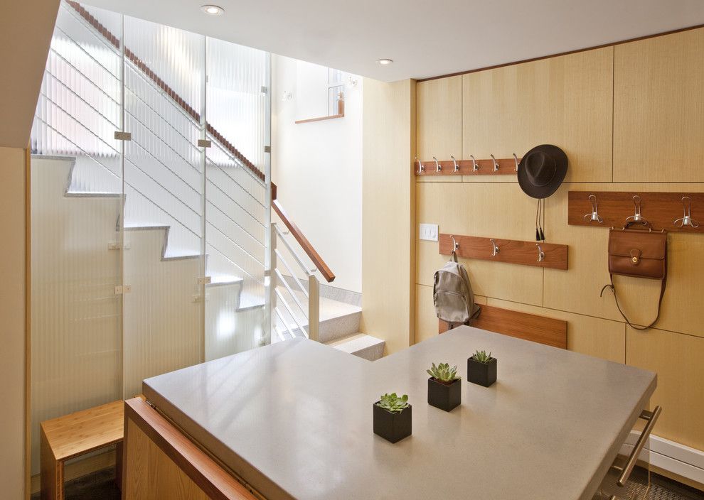 Desk Galore for a Modern Basement with a Bench Seat and North End Townhouse Mudroom by Lda Architecture & Interiors