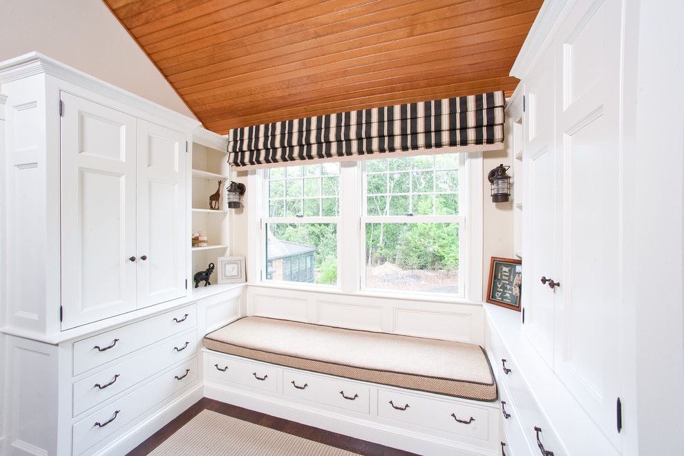 Desk Galore for a Traditional Bedroom with a Beige Rug and Pictures by Horgan Millwork, Inc.