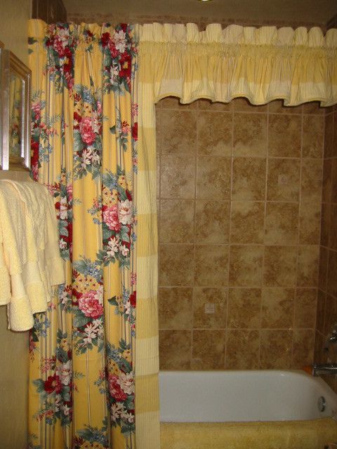 Distinctive Fabrics for a Traditional Spaces with a Valance and Stationary Panel for a Bath and Arizona Project by Designs of Distinction