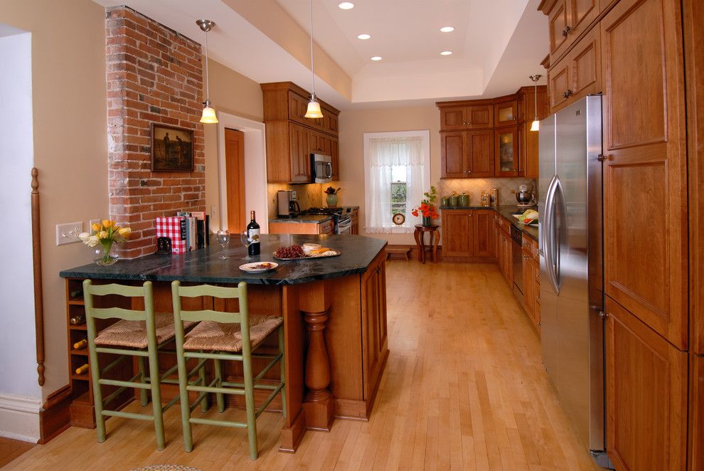 Domicile Furniture for a Traditional Kitchen with a Stainless Appliances and Italian Inspired Kitchen by Bella Domicile