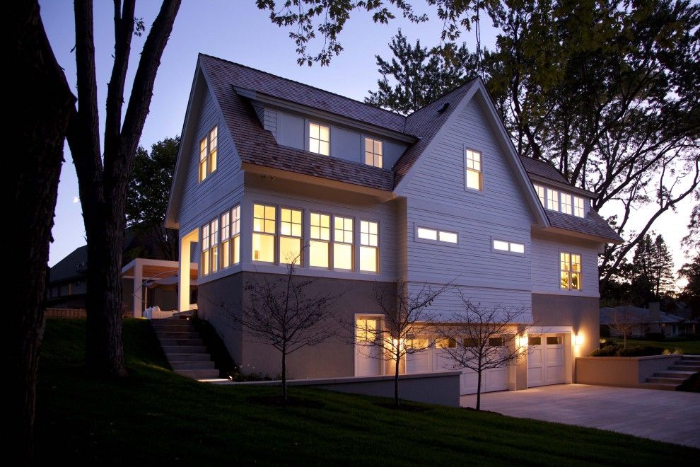 Dormer Windows for a Contemporary Exterior with a White Wood and Exterior   Side by Charlie & Co. Design, Ltd