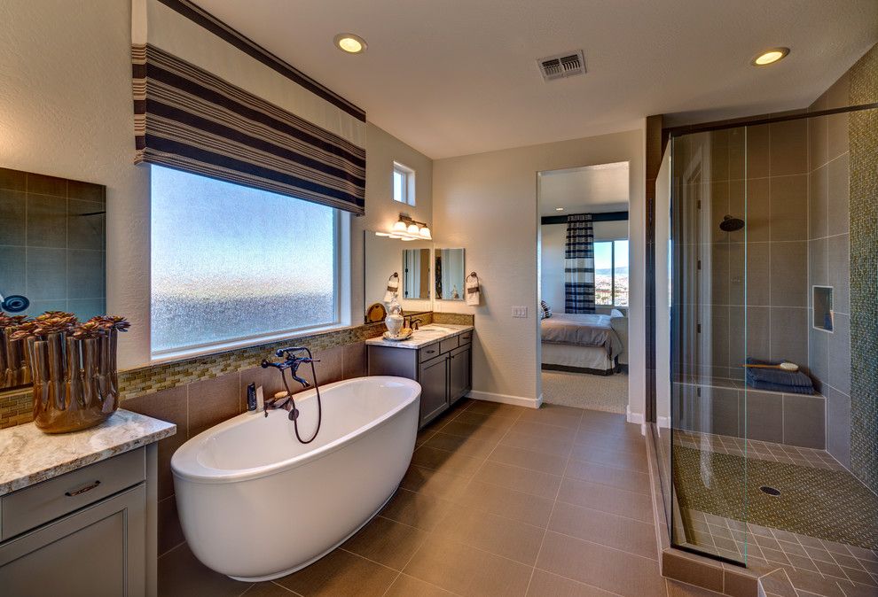 Dorn Homes for a Contemporary Bathroom with a Freestanding Bath and Pinnacle Views at Prescott Lakes by Dorn Homes