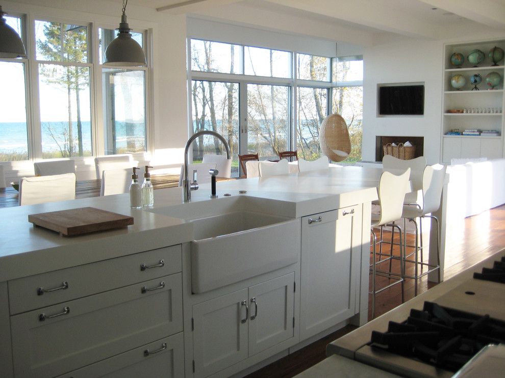 Dornbracht for a Beach Style Kitchen with a Eat in Kitchen and Kitchen by Searl Lamaster Howe Architects