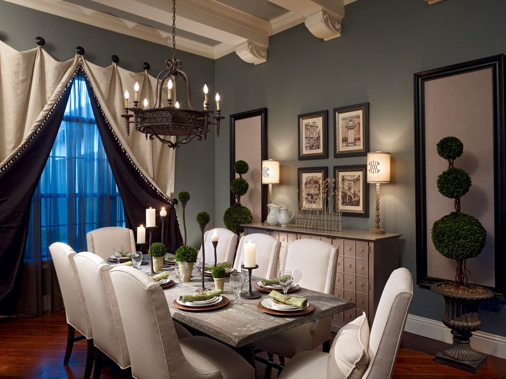 Dovetail Furniture for a Traditional Dining Room with a Wall Panels and Lake Mary Rustic Style Residence by Roman Interior Design