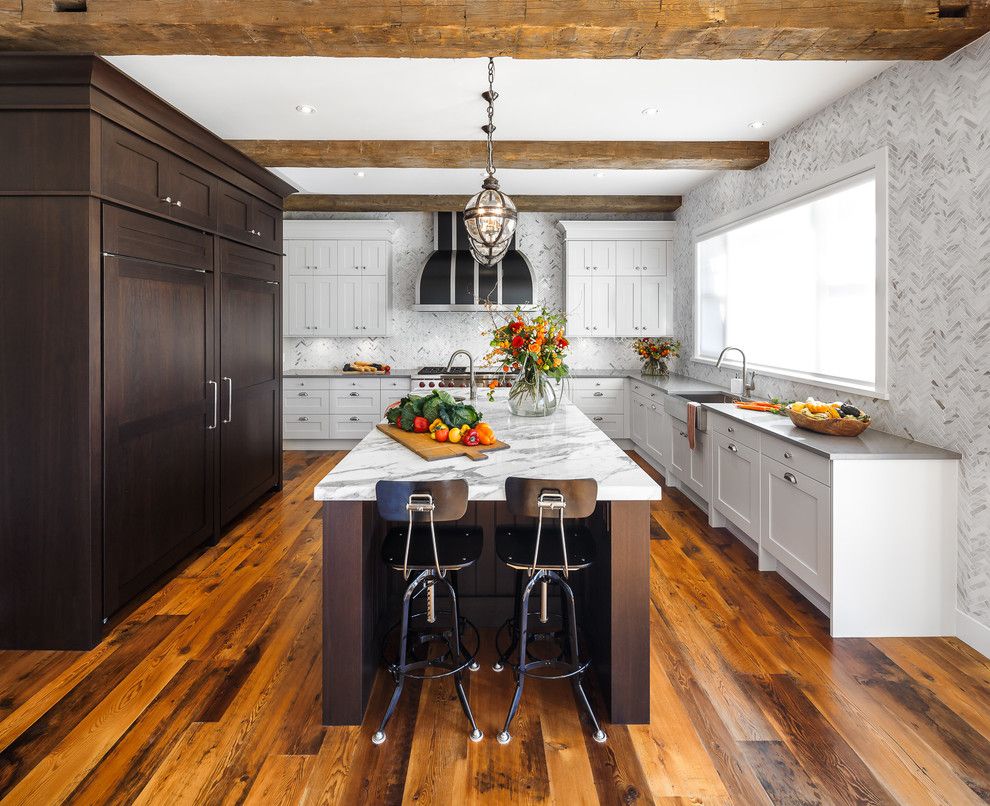 Downsview Kitchens for a Traditional Kitchen with a Marble Backsplash and Rough Luxe Residence   Ottawa   Astro Design Centre by Astro Design Centre